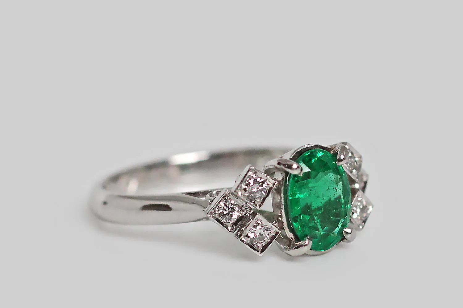 Art Deco Era Emerald & Diamond Engagement Ring with Geometric Epaulettes in Platinum