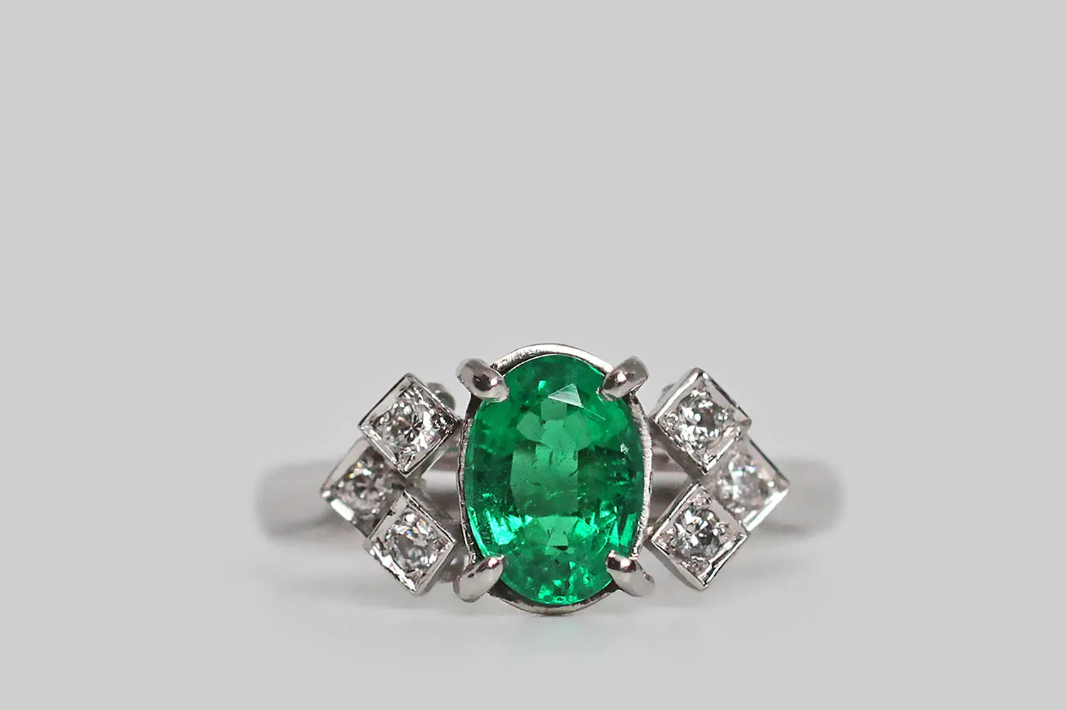 Art Deco Era Emerald & Diamond Engagement Ring with Geometric Epaulettes in Platinum