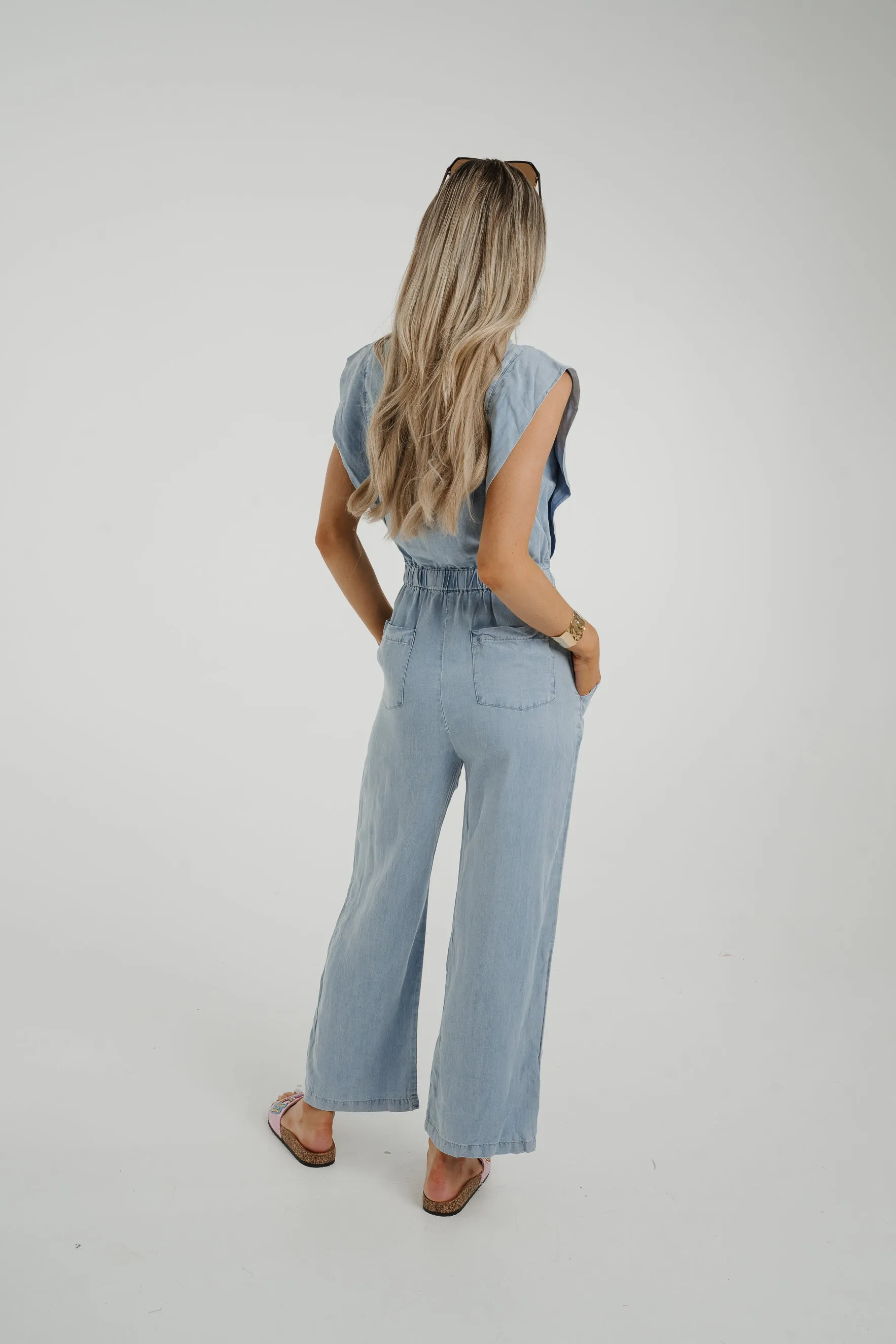 Cora Frill Shoulder Jumpsuit In Light Wash