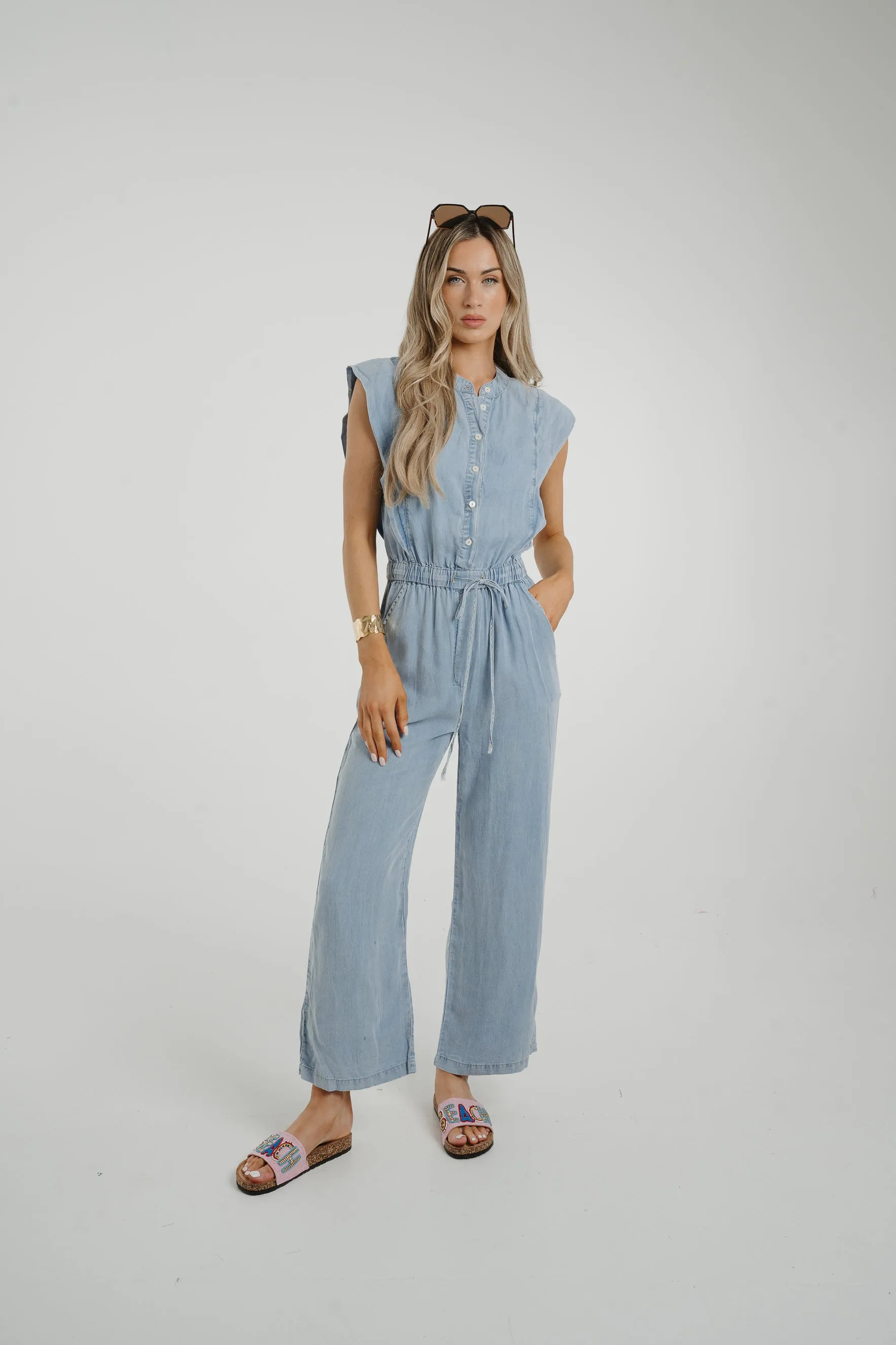 Cora Frill Shoulder Jumpsuit In Light Wash