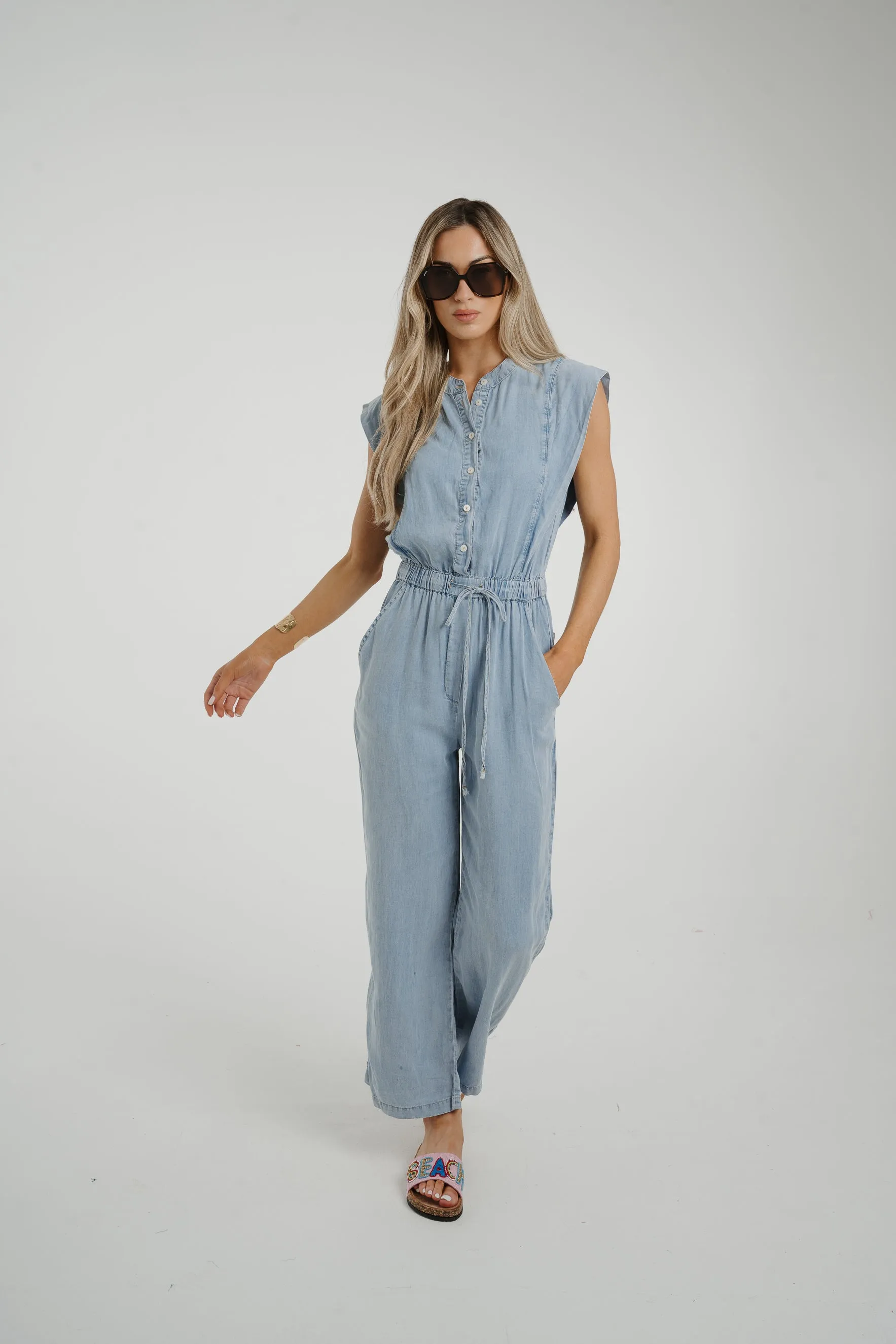 Cora Frill Shoulder Jumpsuit In Light Wash