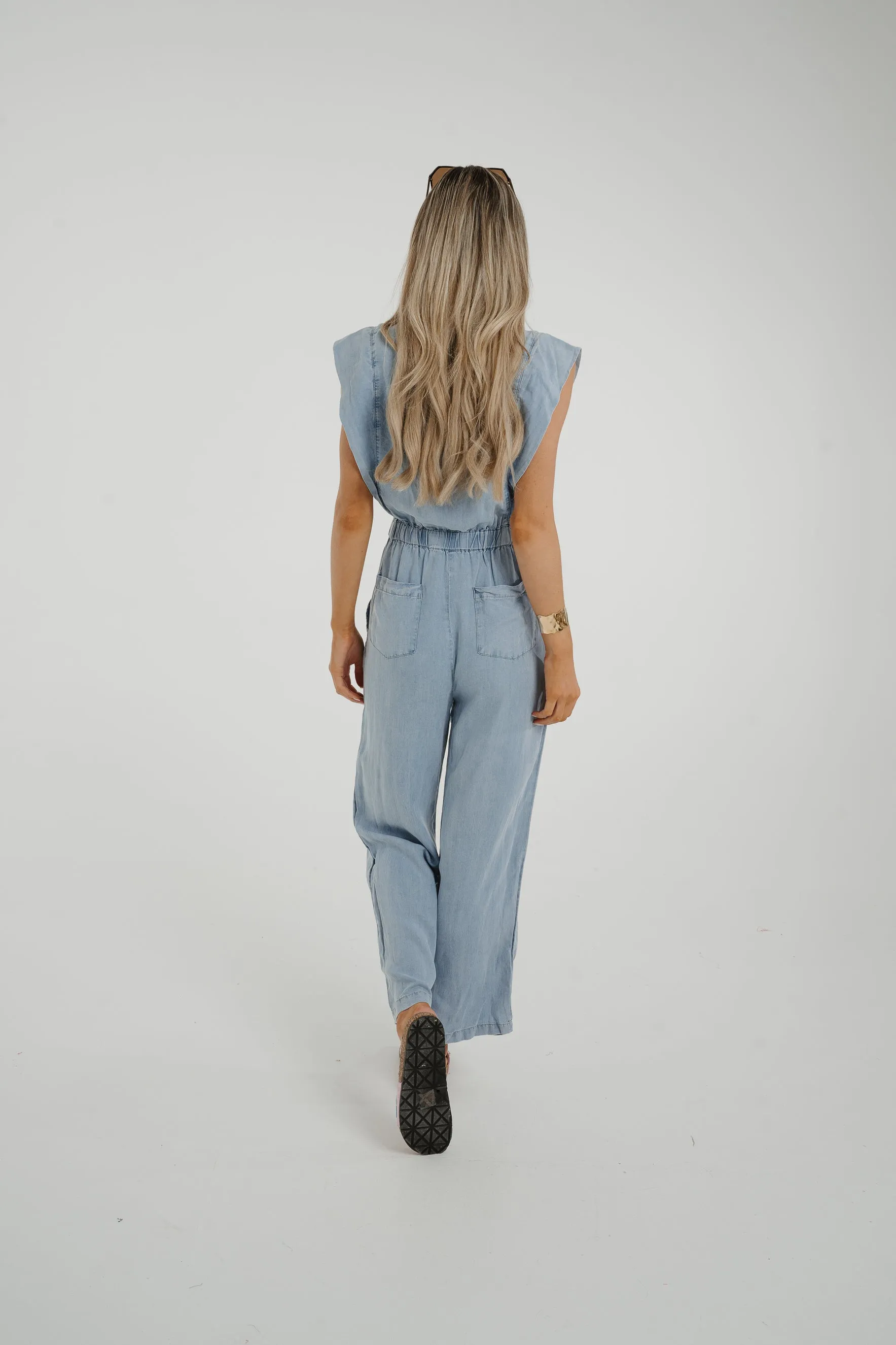 Cora Frill Shoulder Jumpsuit In Light Wash