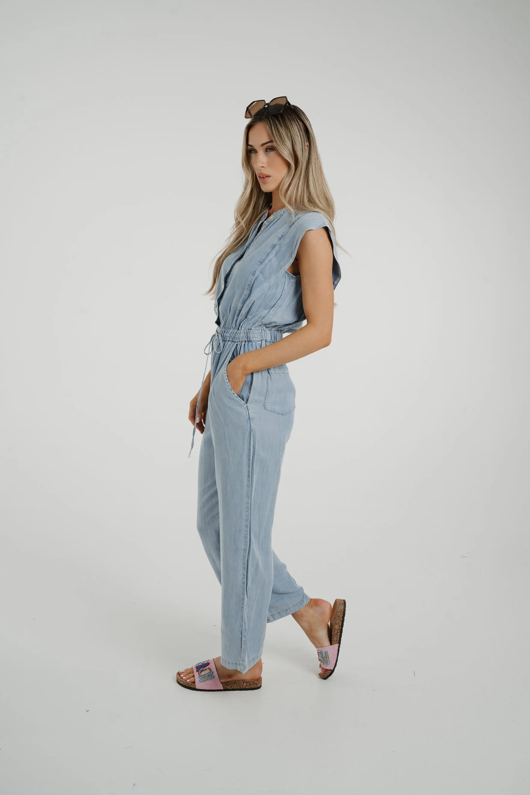 Cora Frill Shoulder Jumpsuit In Light Wash