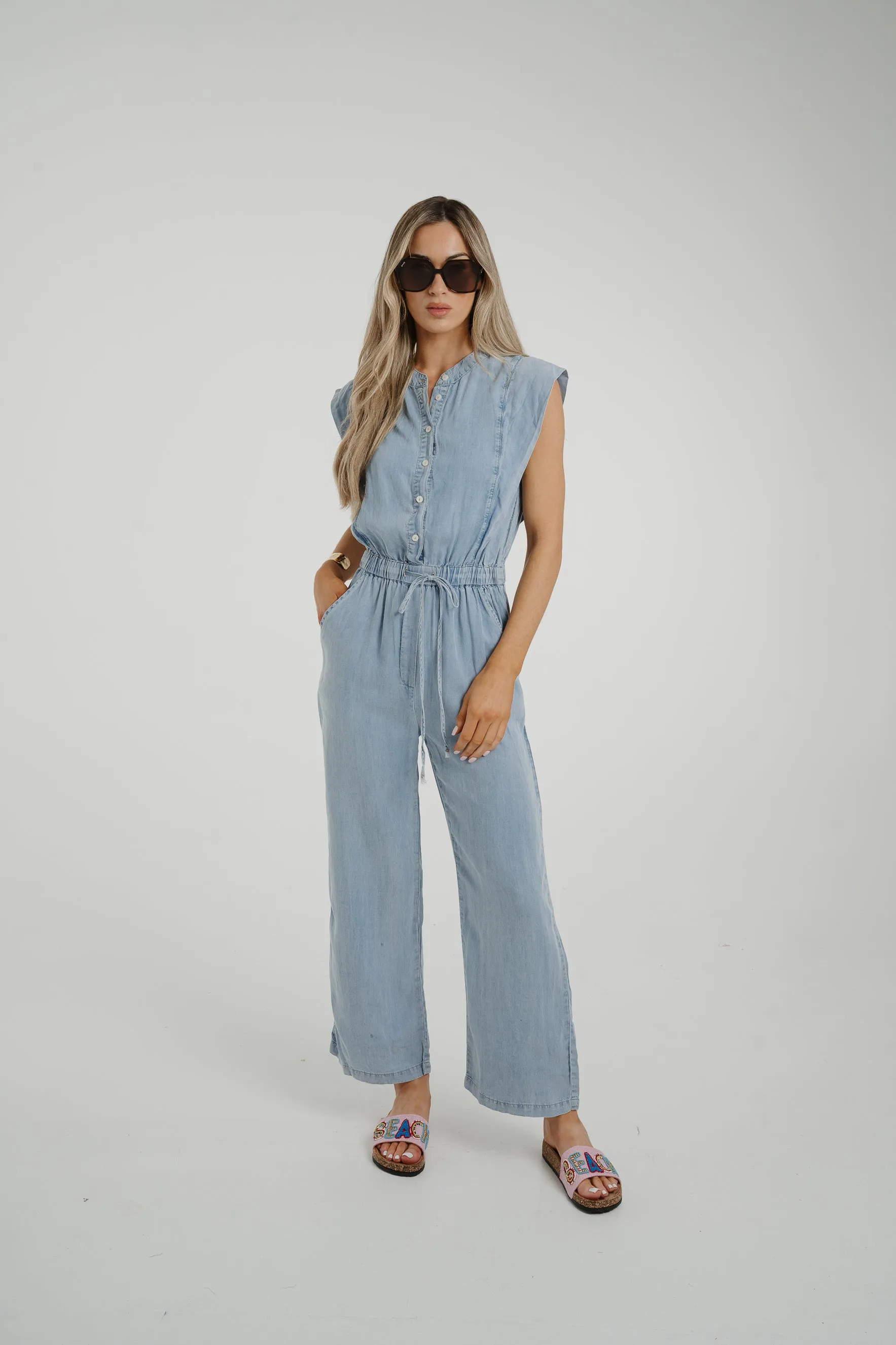 Cora Frill Shoulder Jumpsuit In Light Wash