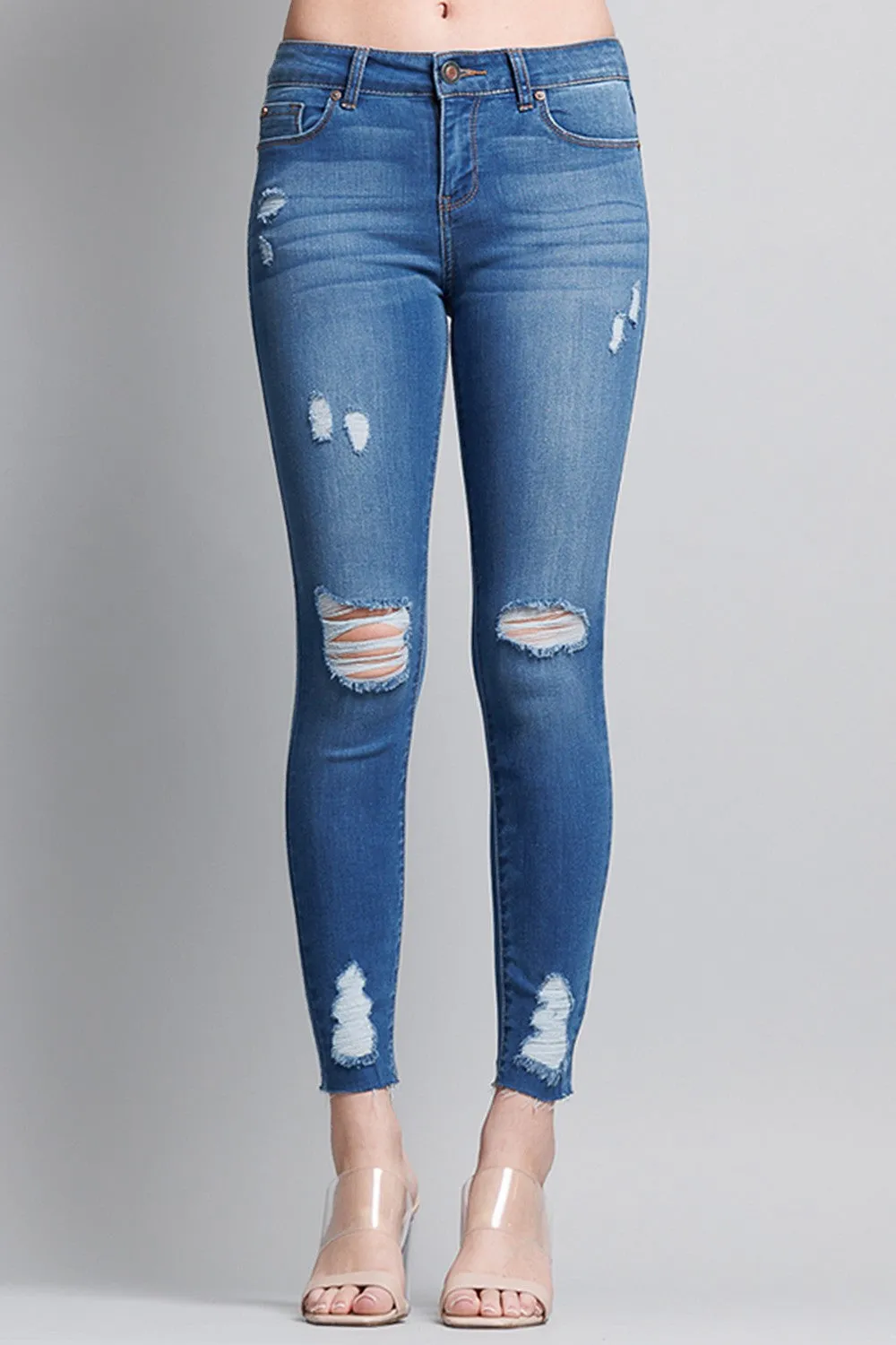 Distressed Mid Rise Skinny Jeans with Chewed Hems