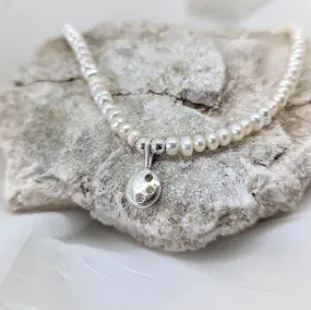 Pearl Necklace with Silver Pebble Pendant