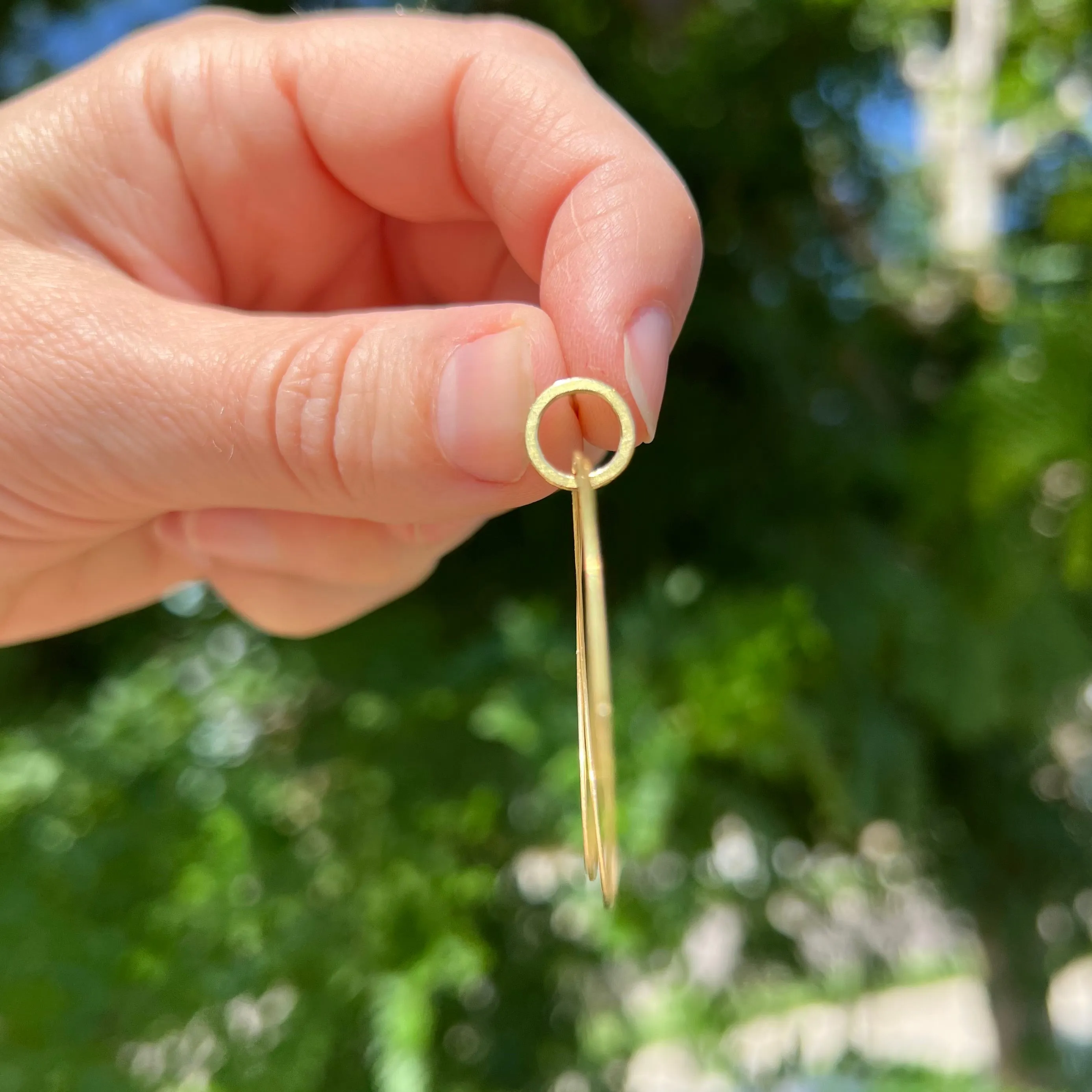 Small double hoop earrings in 18k gold